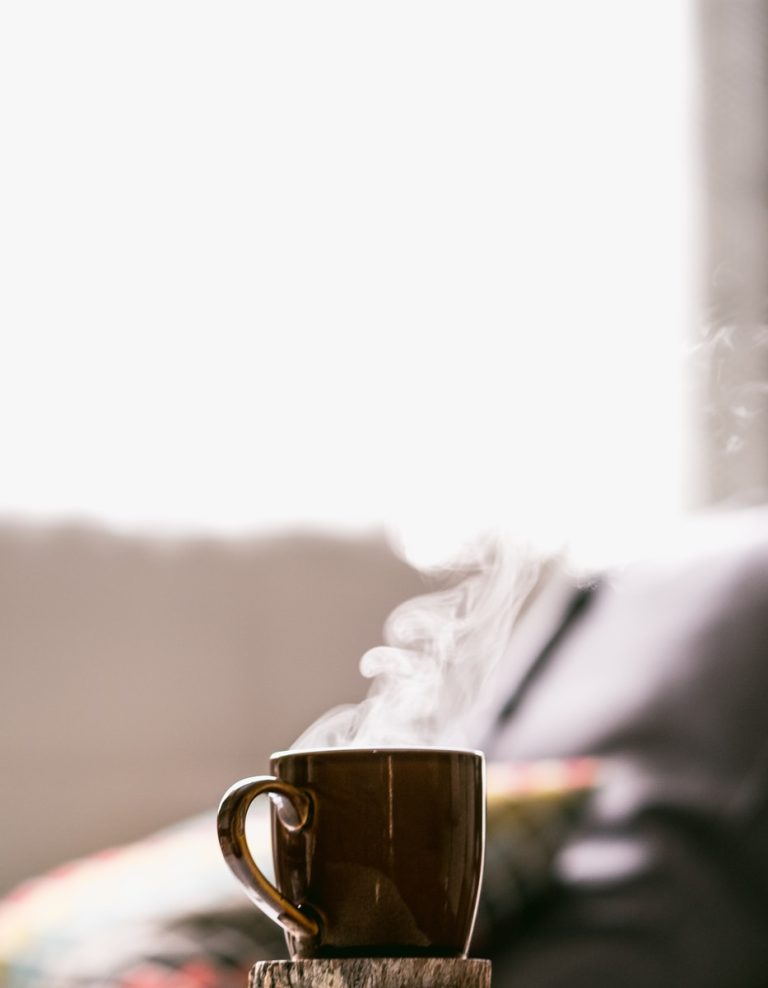 Shallow Focus Photography Of Hot Coffee In Mug With Saucer